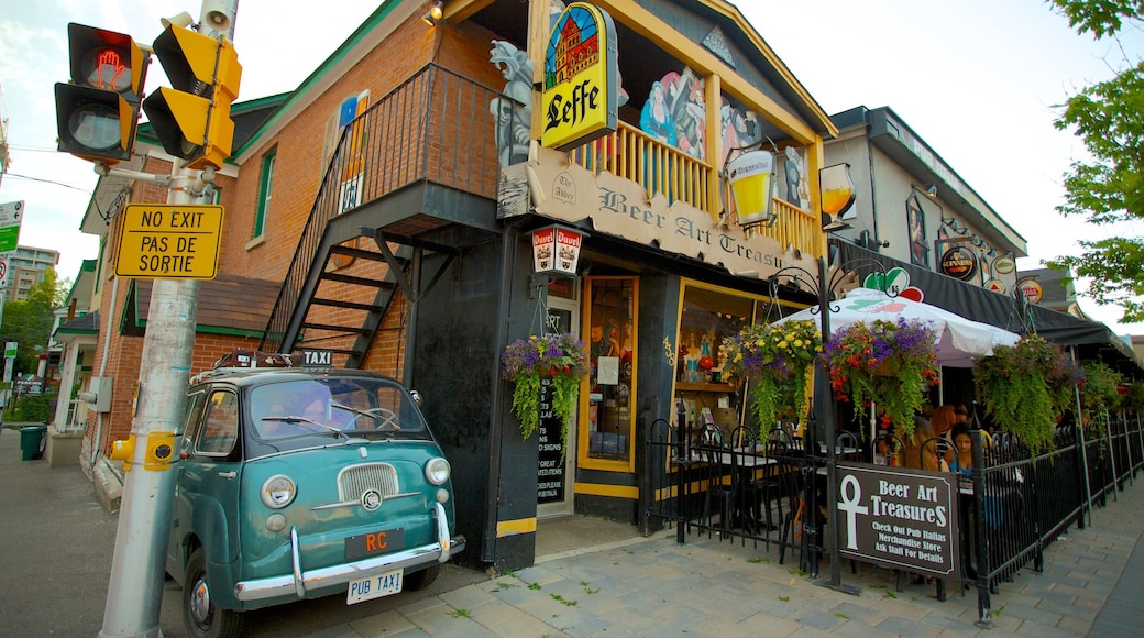 Little Italy showing signage, street scenes and a city