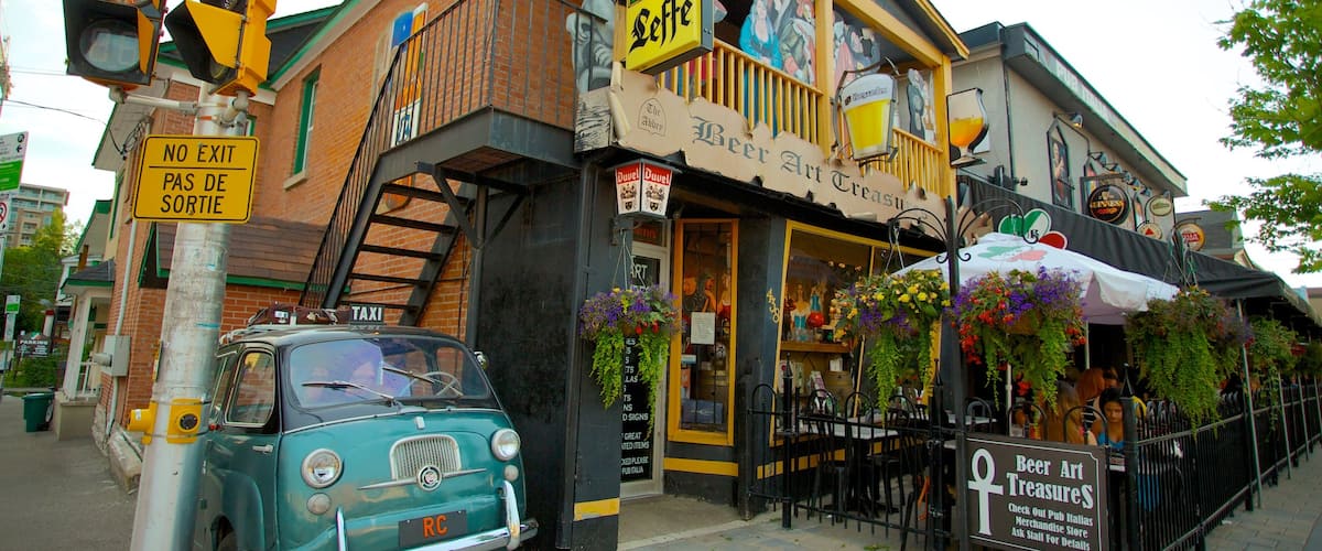Little Italy which includes street scenes, a city and signage