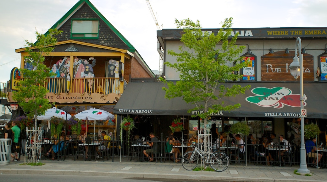 Little Italy showing street scenes, a bar and outdoor eating