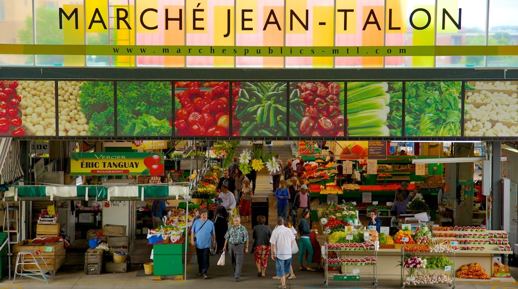 Marché Jean-Talon mostrando una ciudad, señalización y mercados