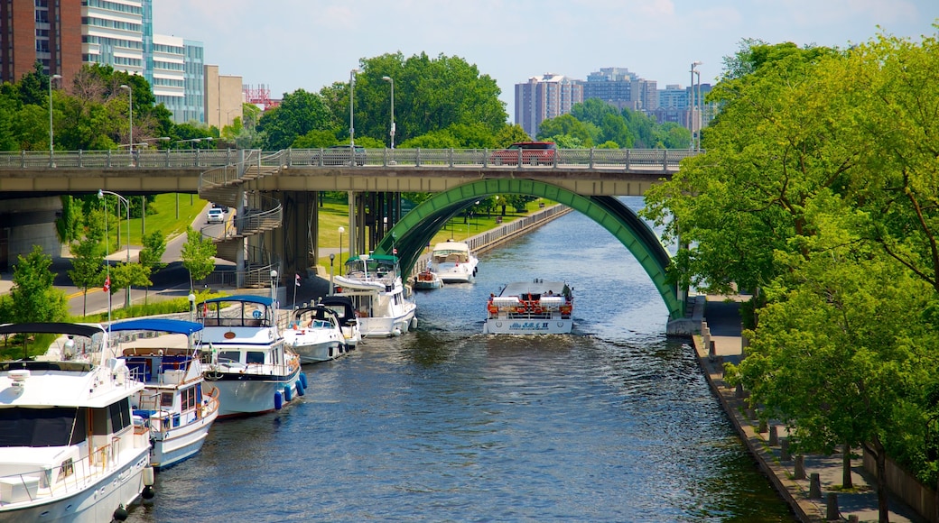 Rideau Canal showing a river or creek, boating and a bridge