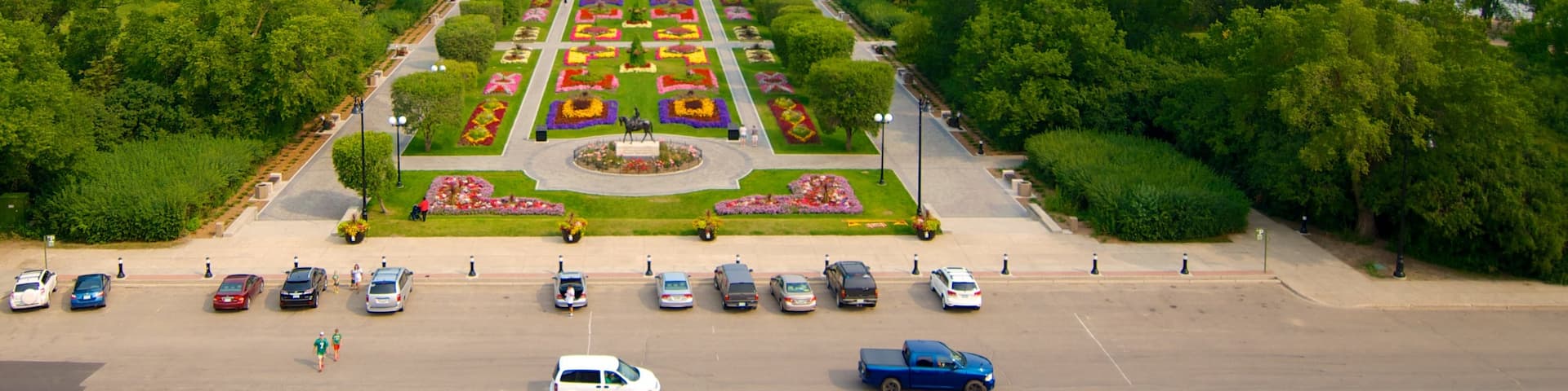 Saskatchewan Legislative Building which includes a river or creek, a park and a city