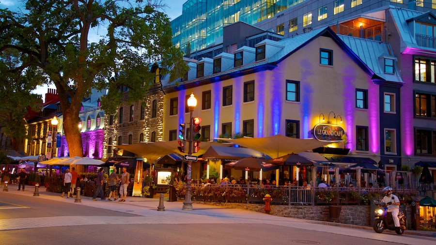Grande Allee which includes dining out, night scenes and a city
