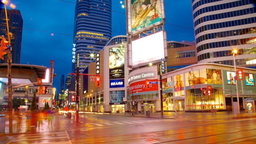 Yonge Street Shopping District featuring street scenes, modern architecture and a skyscraper