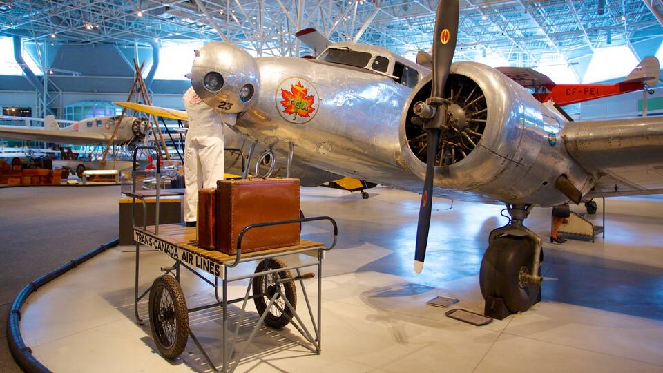 Canada Aviation and Space Museum which includes aircraft and interior views as well as an individual male