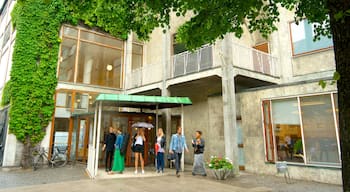 Aarhus City Hall showing an administrative building as well as a small group of people