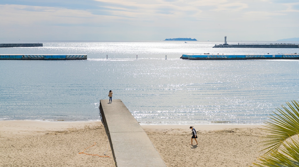 Atami Sun Beach which includes a beach and general coastal views