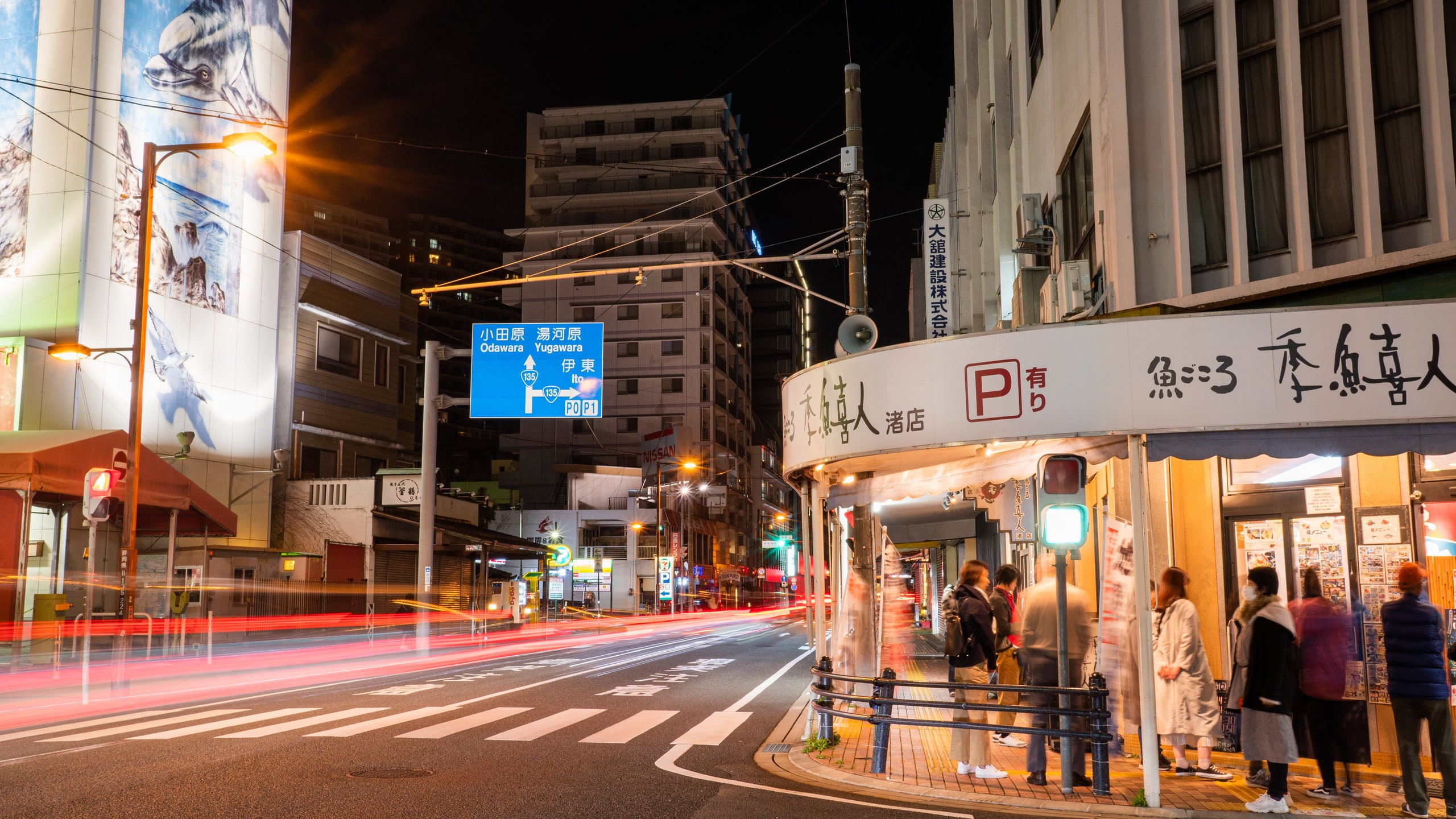 Atami showing night scenes, street scenes and a city