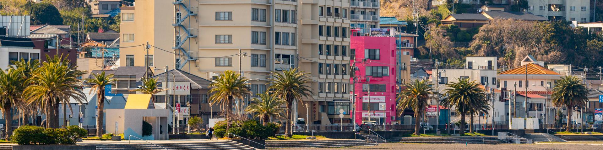 Ito Orange Beach showing a beach and a coastal town