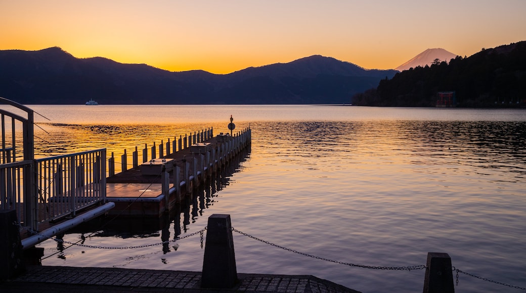 Hakone featuring a lake or waterhole and a sunset