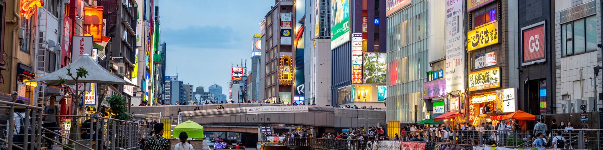 Dotonbori showing city views, a river or creek and a city