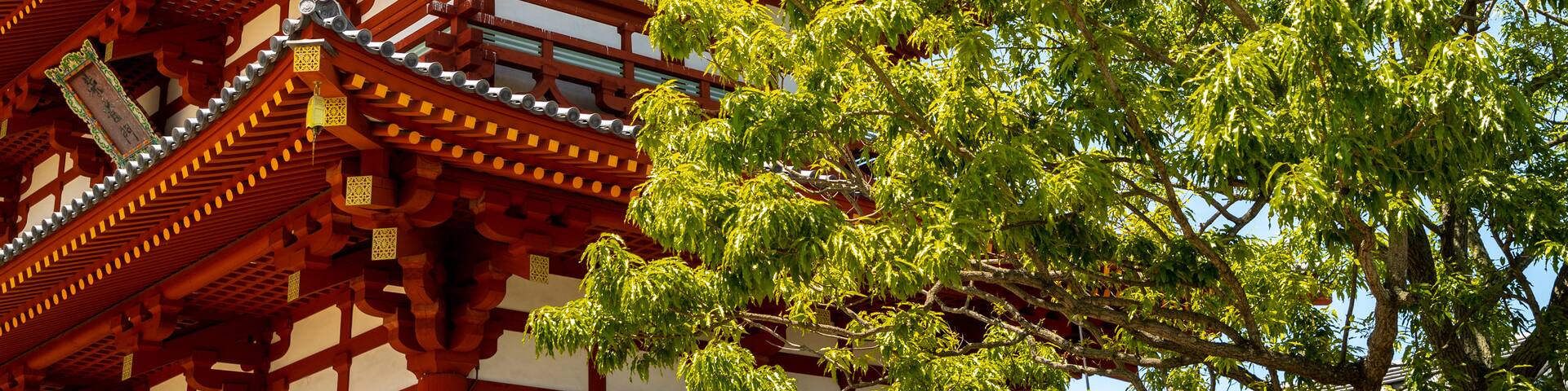 Suzakumon Gate which includes heritage elements and a temple or place of worship