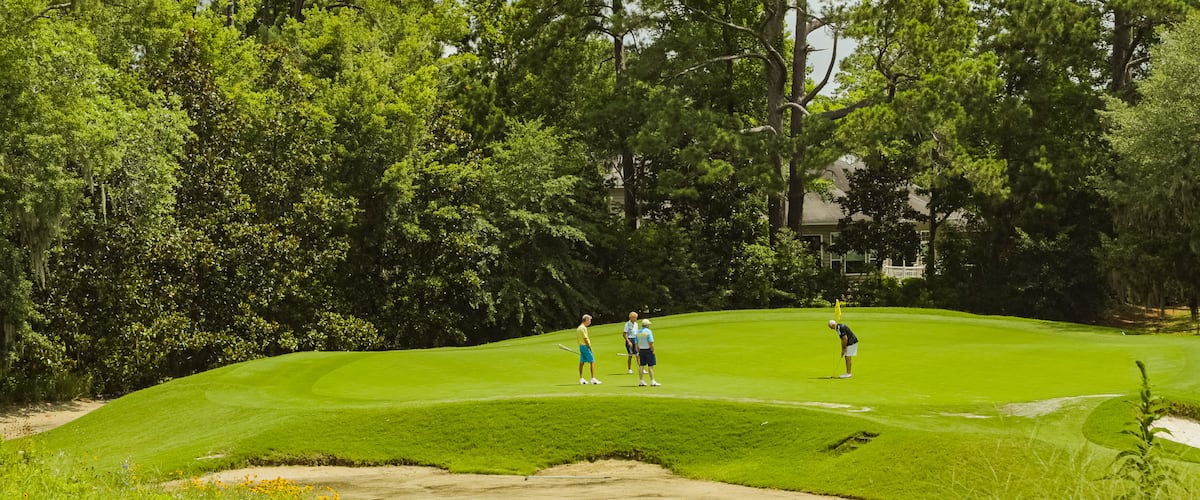 Caledonia Golf and Fish Club which includes golf as well as a small group of people