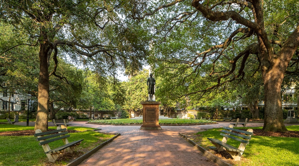 Washington Square featuring a statue or sculpture and a park