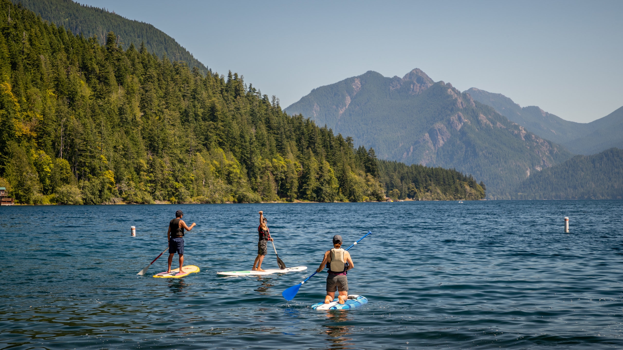 Crescent Beach showing a lake or waterhole and kayaking or canoeing as well as a small group of people