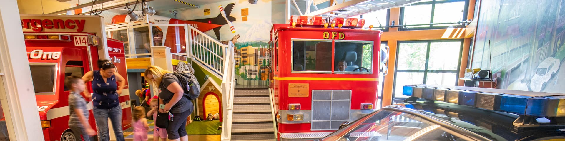 Hands On Children\'s Museum featuring interior views as well as a family