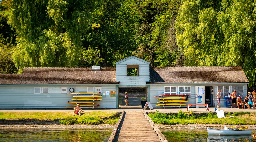 Mount Baker Beach featuring a lake or waterhole as well as a small group of people