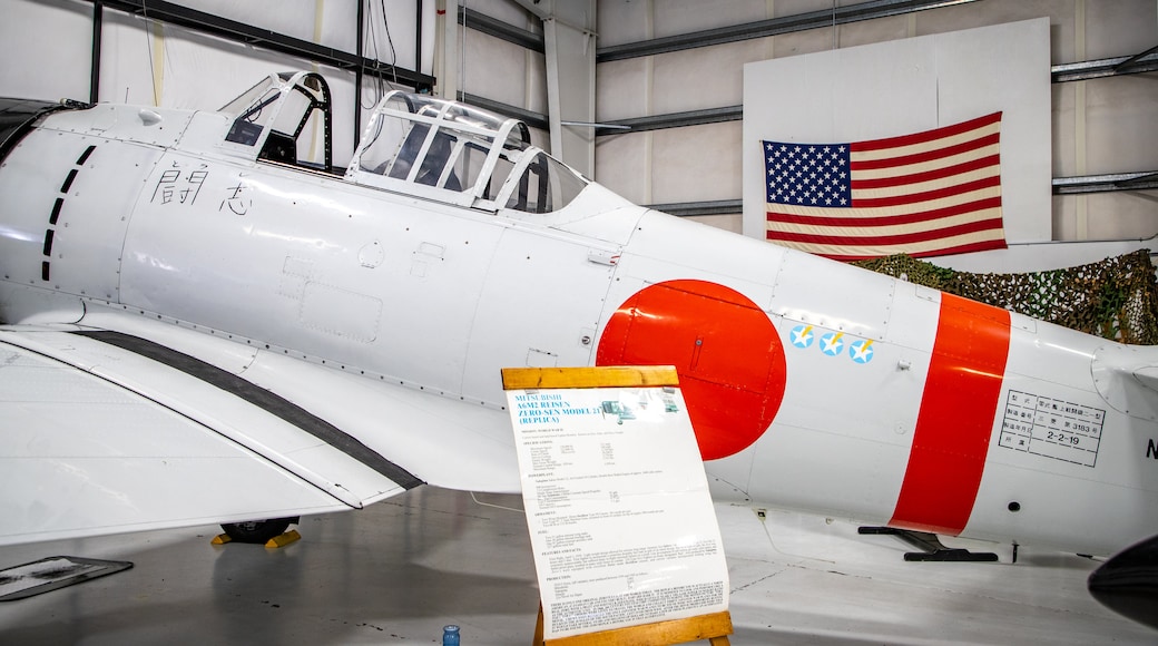 Olympic Flight Museum featuring aircraft, signage and military items