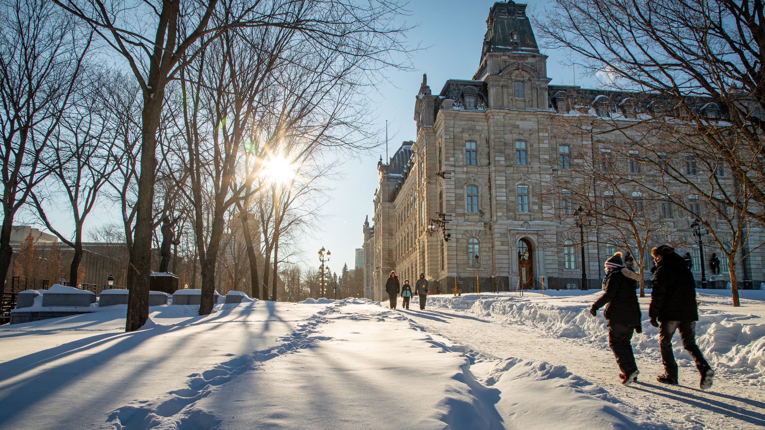 Quebec showing heritage architecture, a sunset and snow