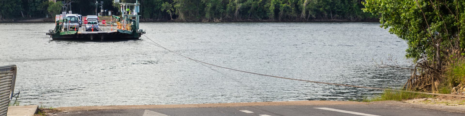 Lower Daintree featuring a ferry and a lake or waterhole
