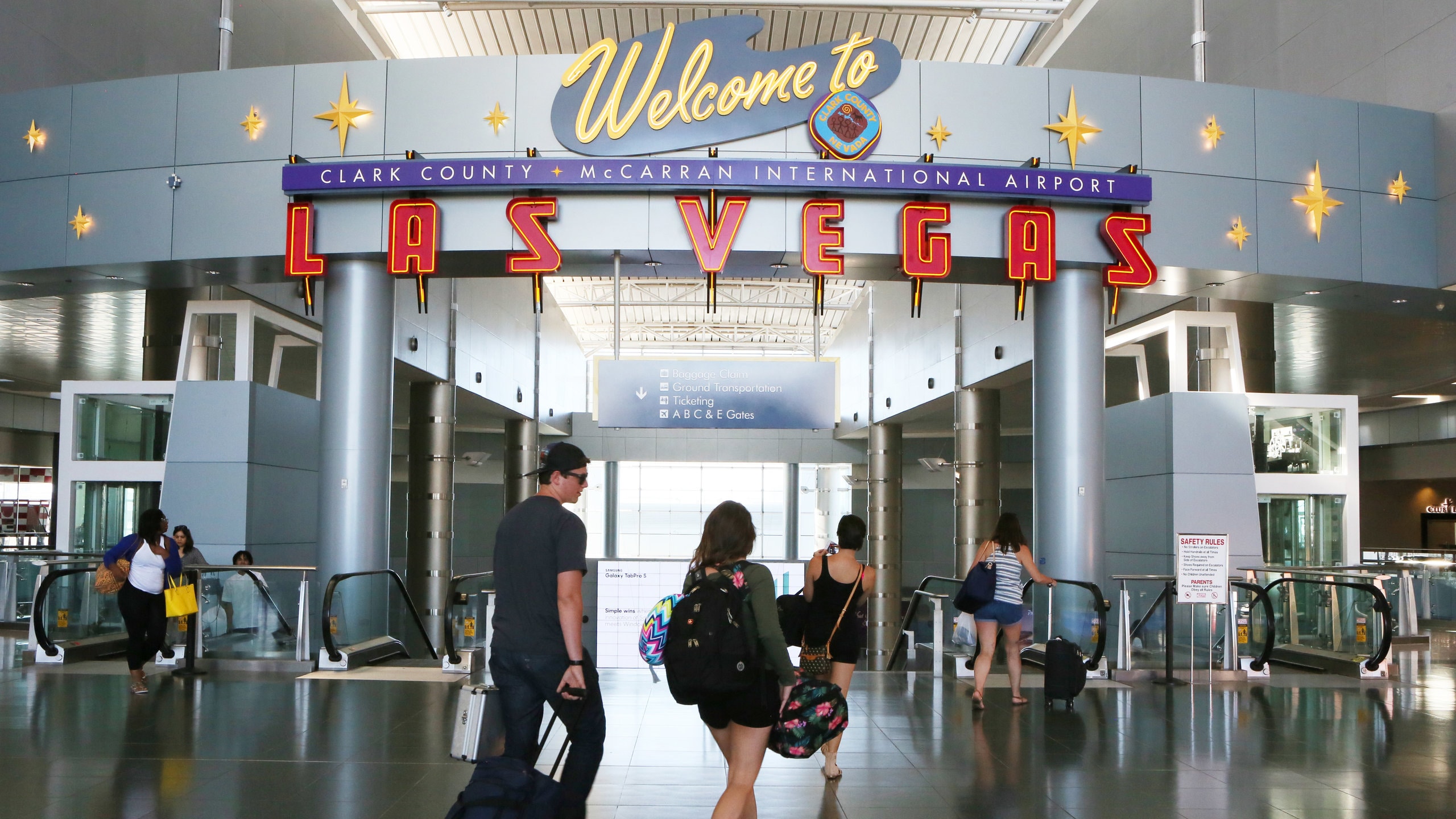 Las Vegas, NV showing an airport, signage and interior views