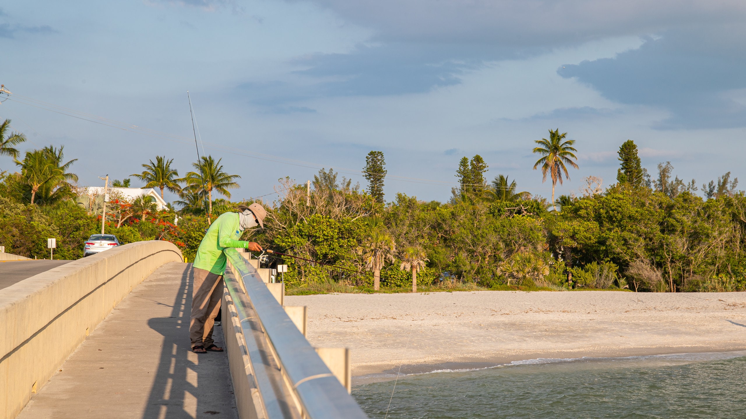 Captiva showing fishing and a river or creek as well as an individual male