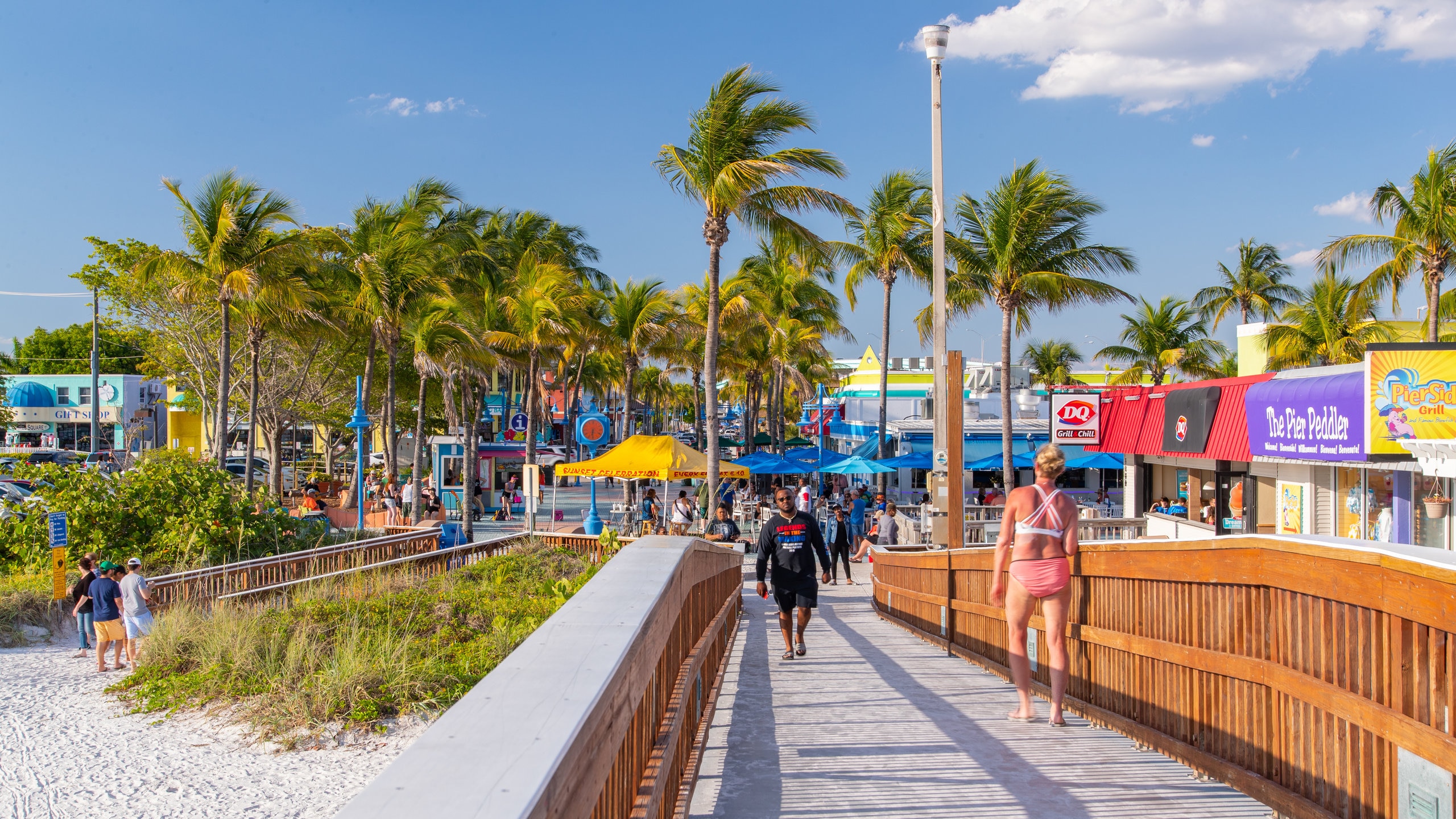 Fishing Pier Fort Myers Beach featuring a sandy beach and a bridge