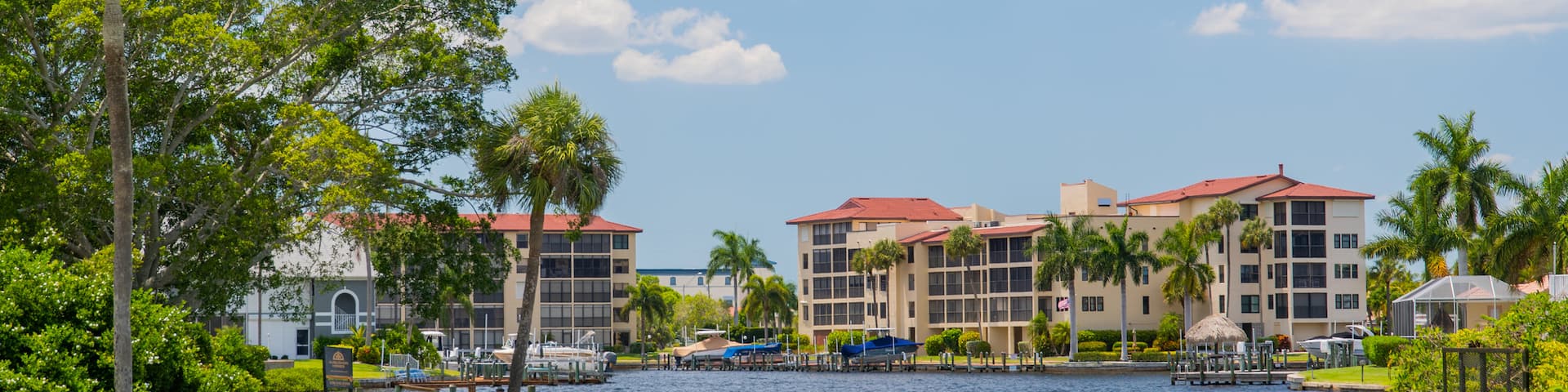 Cape Coral which includes a lake or waterhole and a garden