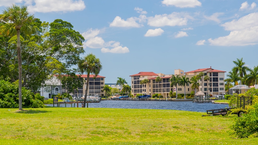 Cape Coral which includes a lake or waterhole and a garden