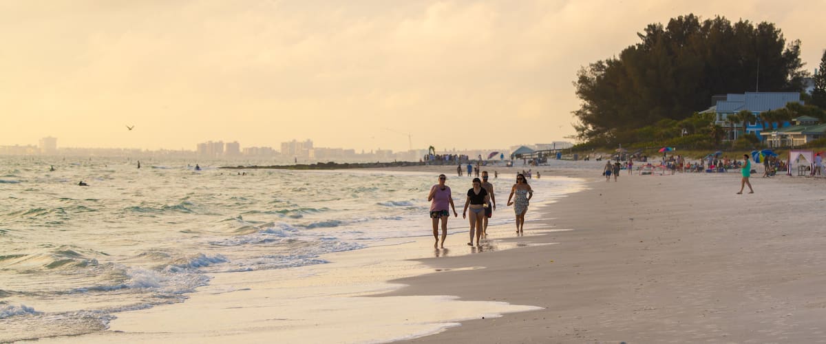 Treasure Island which includes a beach and general coastal views