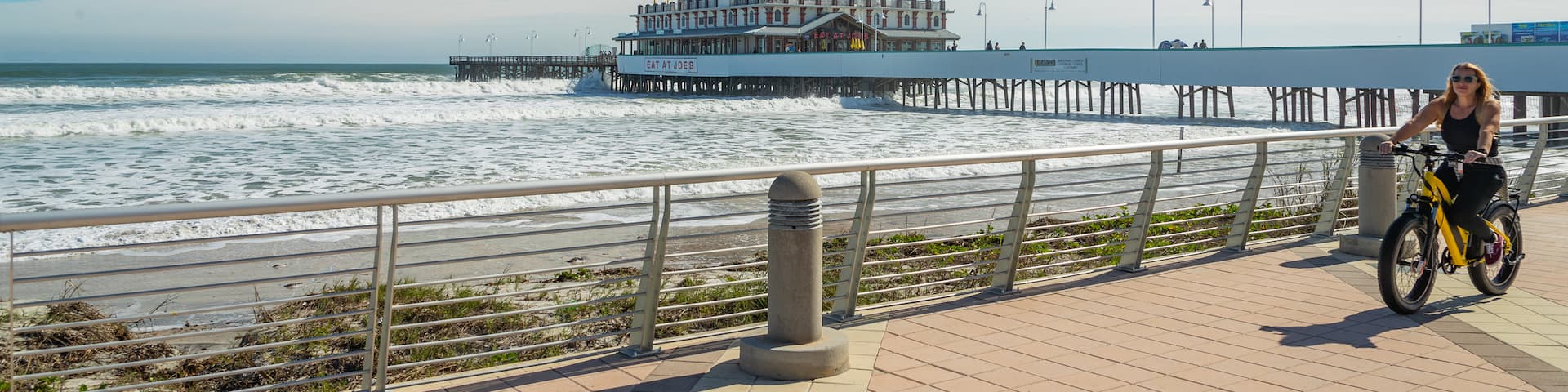 Daytona Beach Boardwalk featuring general coastal views