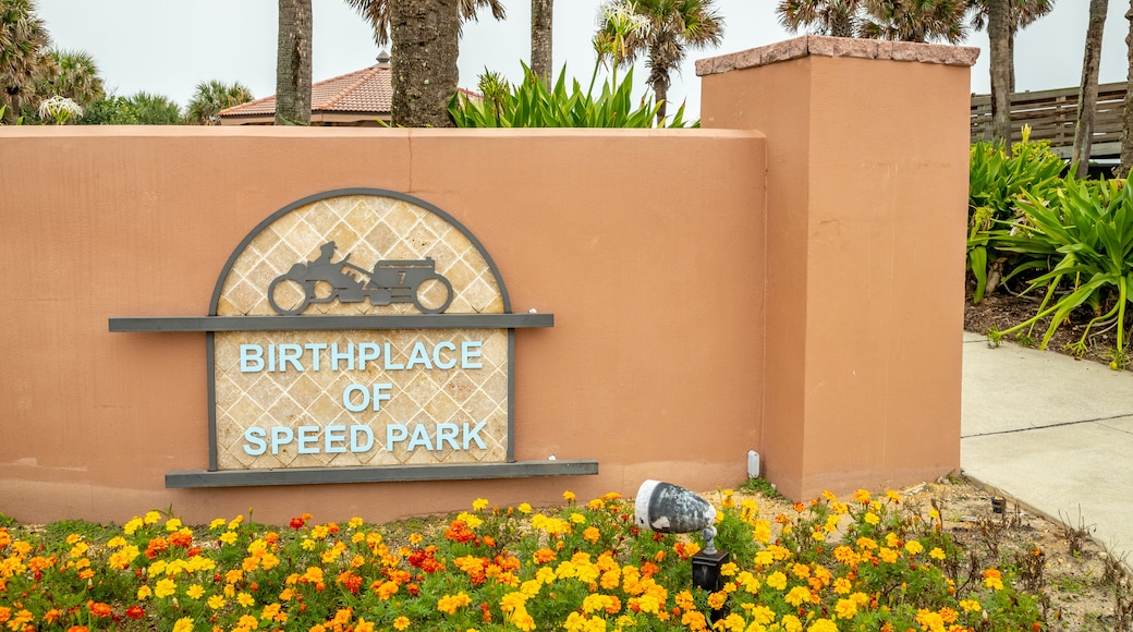 Birthplace of Speed Park showing signage and flowers