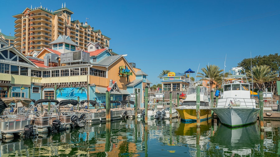 Waterfront view of HarborWalk Village with shops, restaurants, and boats in Destin, Florida.