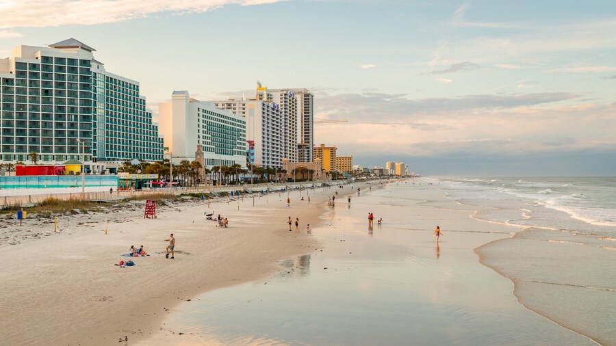 Beach at Daytona Beach which includes a sunset, a beach and general coastal views