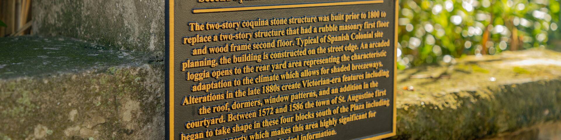 Segui-Kirby Smith House featuring signage and heritage elements