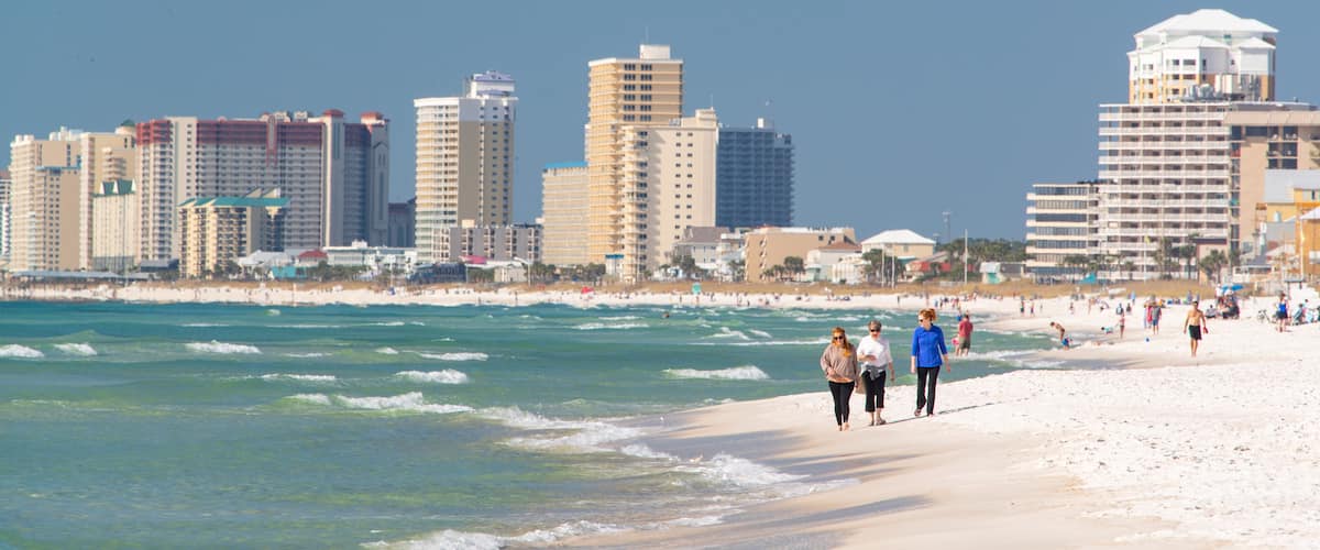 Florida Panhandle featuring a coastal town, a sandy beach and general coastal views