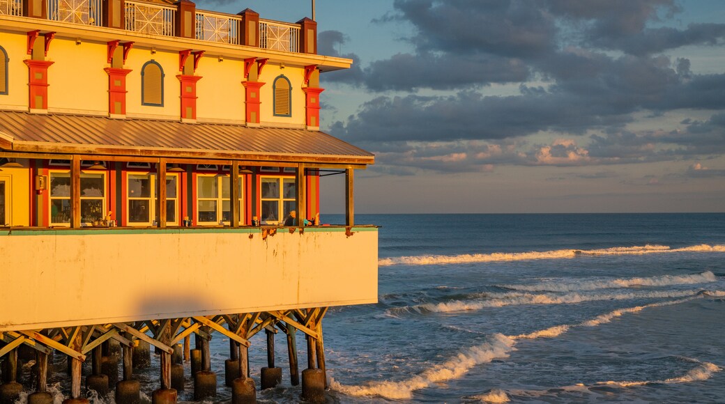 Daytona Beach Pier showing general coastal views and a sunset