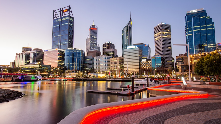 Elizabeth Quay which includes a sunset, a city and a bay or harbor