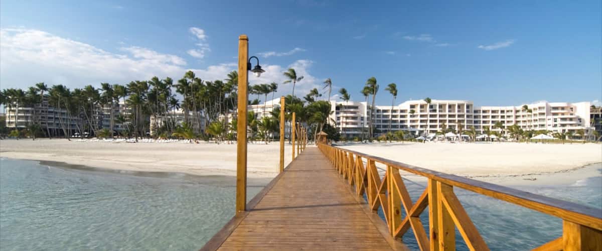 Juan Dolio which includes views, a beach and a coastal town