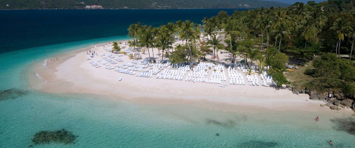 Dominican Republic featuring a beach, a luxury hotel or resort and tropical scenes