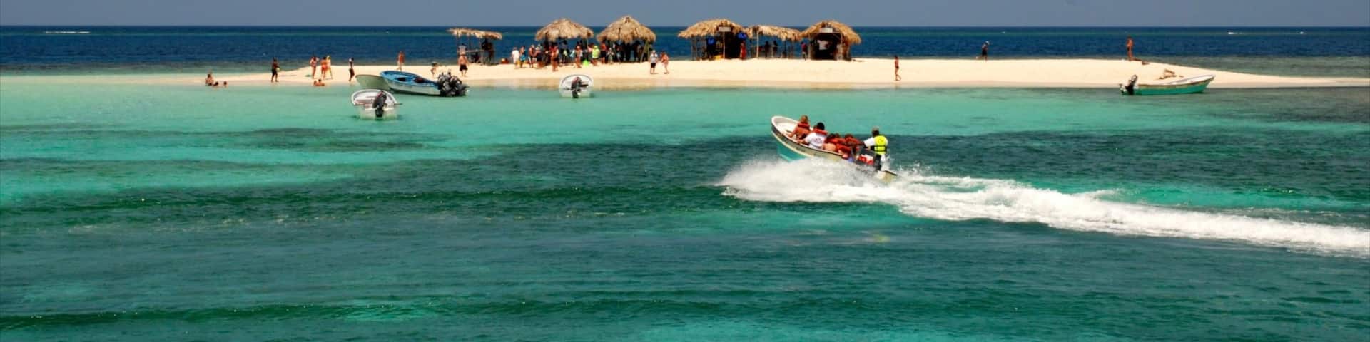 Dominican Republic featuring boating, island images and colourful reefs