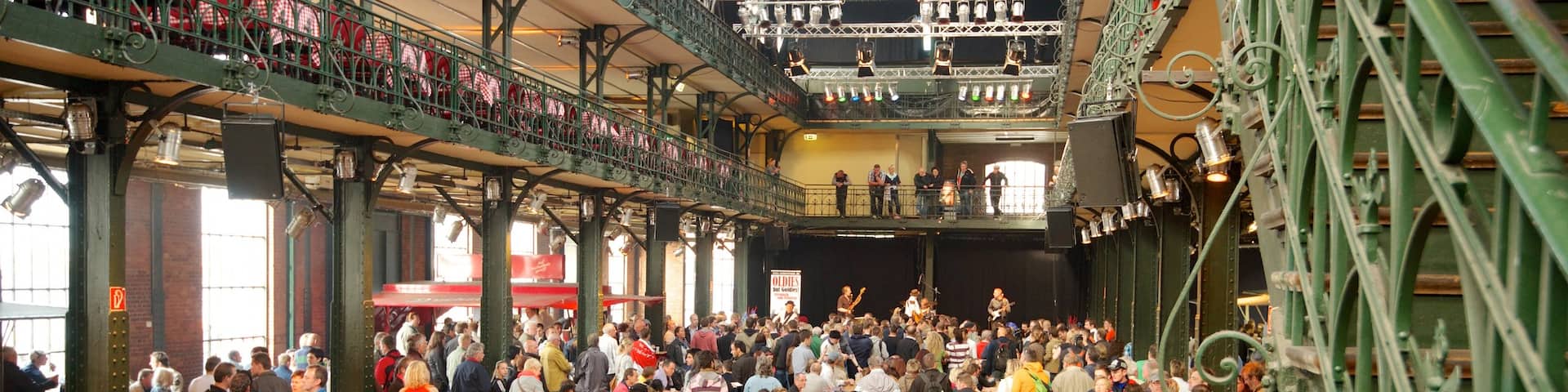 Fish Market which includes interior views and markets as well as a large group of people