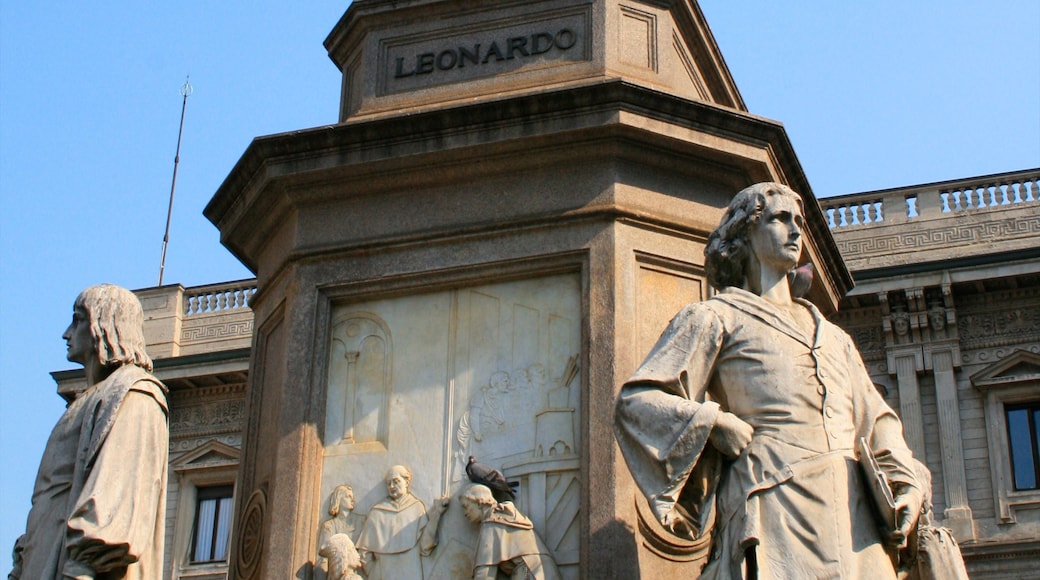 Teatro alla Scala toont een standbeeld of beeldhouwwerk en een monument