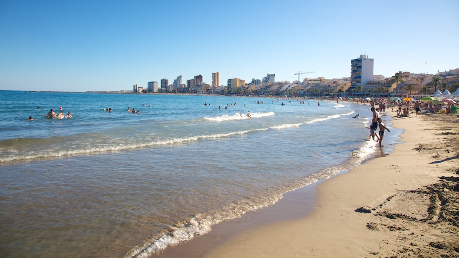 Alicante which includes a coastal town, landscape views and a sandy beach