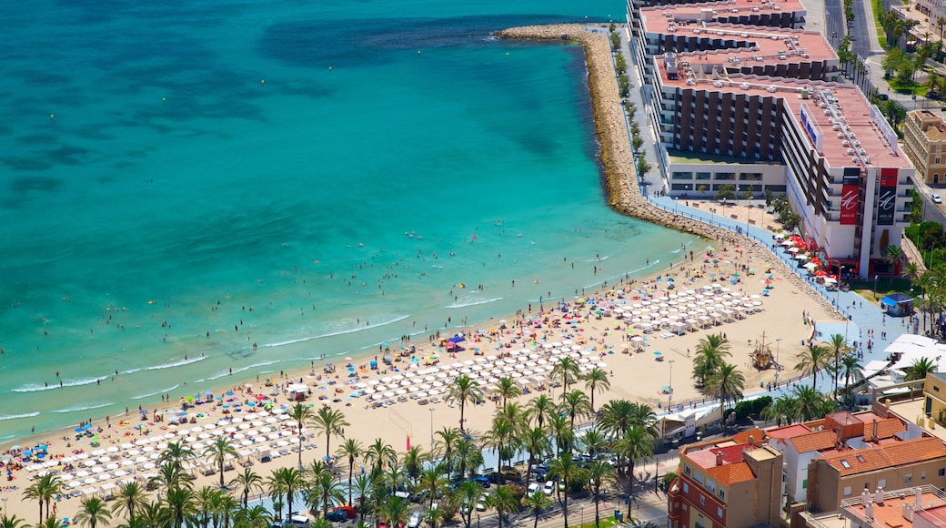 Castle of Santa Barbara showing tropical scenes, a luxury hotel or resort and a sandy beach