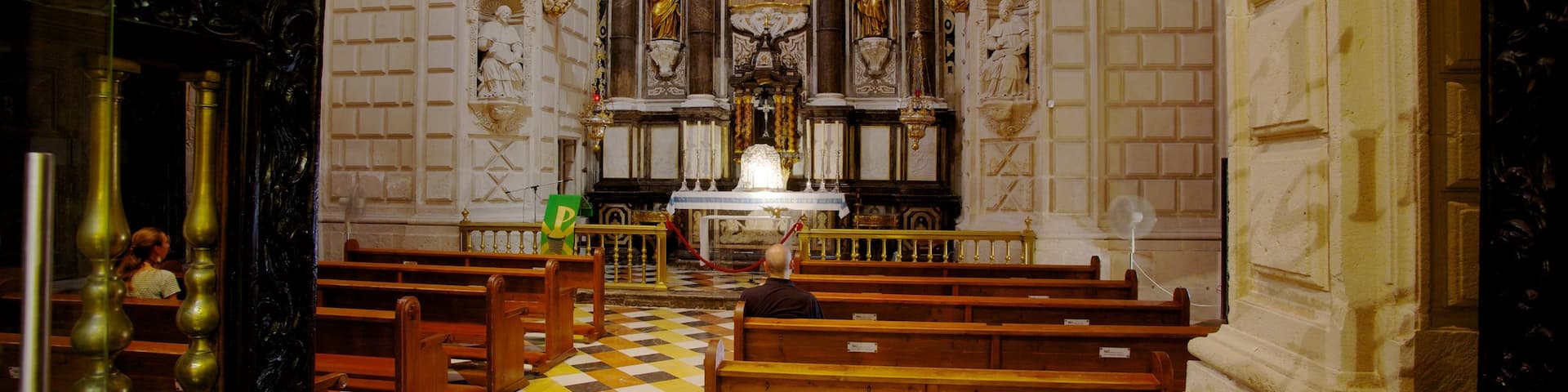 San Nicolas Cathedral featuring interior views, a church or cathedral and religious elements