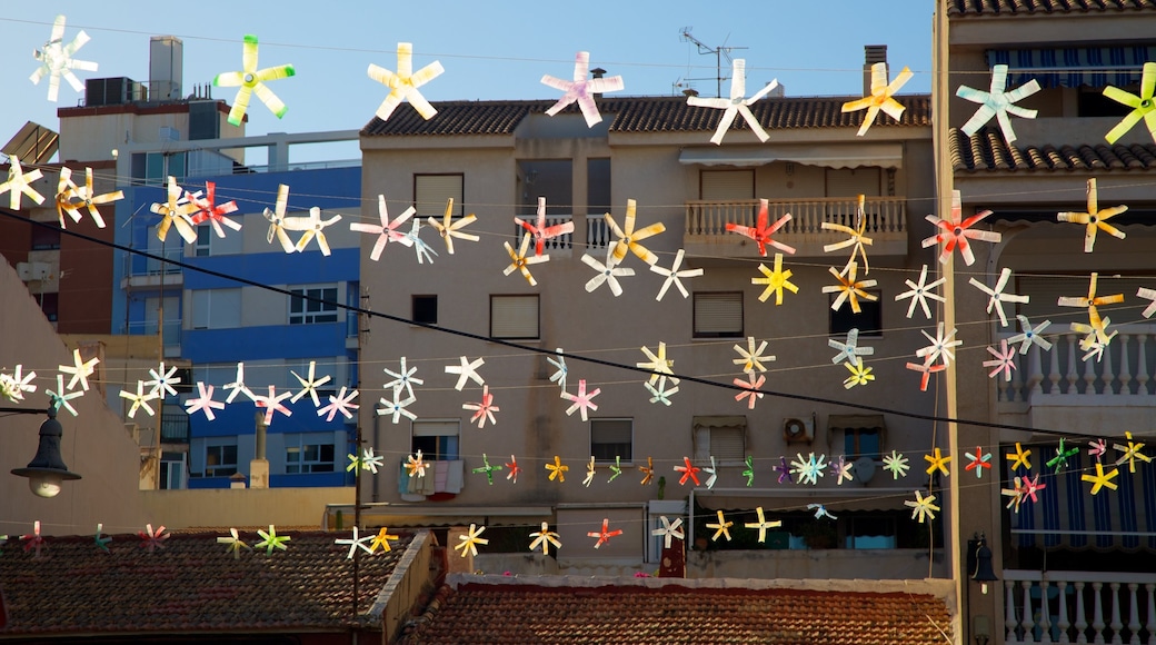 Campello Beach showing a coastal town and outdoor art