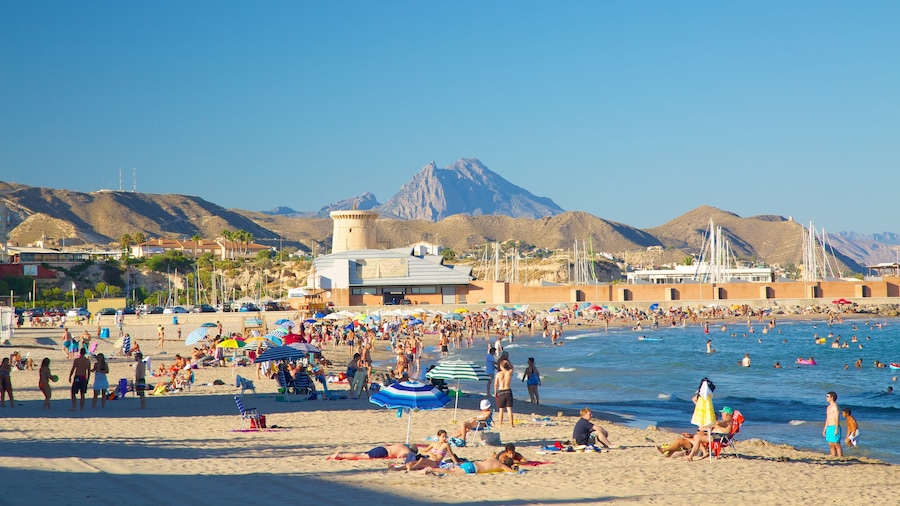 Campello Beach which includes swimming, a sandy beach and a bay or harbor
