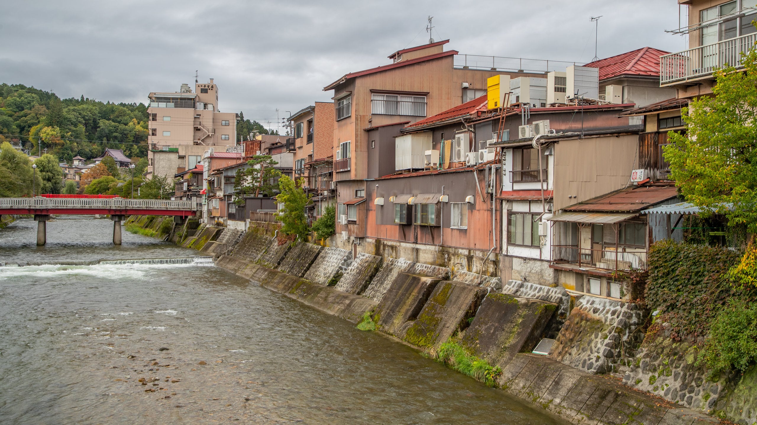 Takayama featuring a bridge and a river or creek