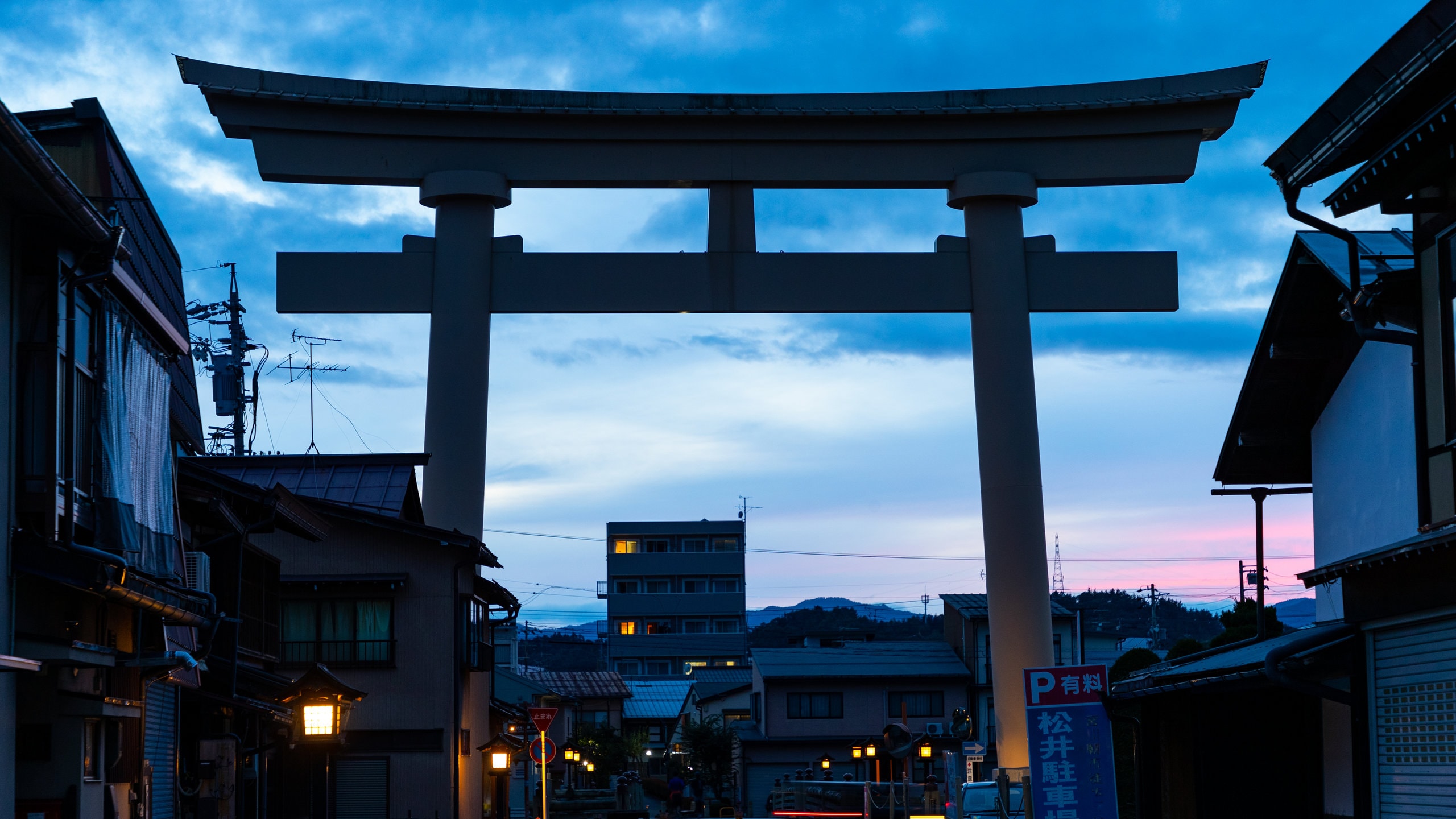 Takayama which includes heritage elements and a sunset